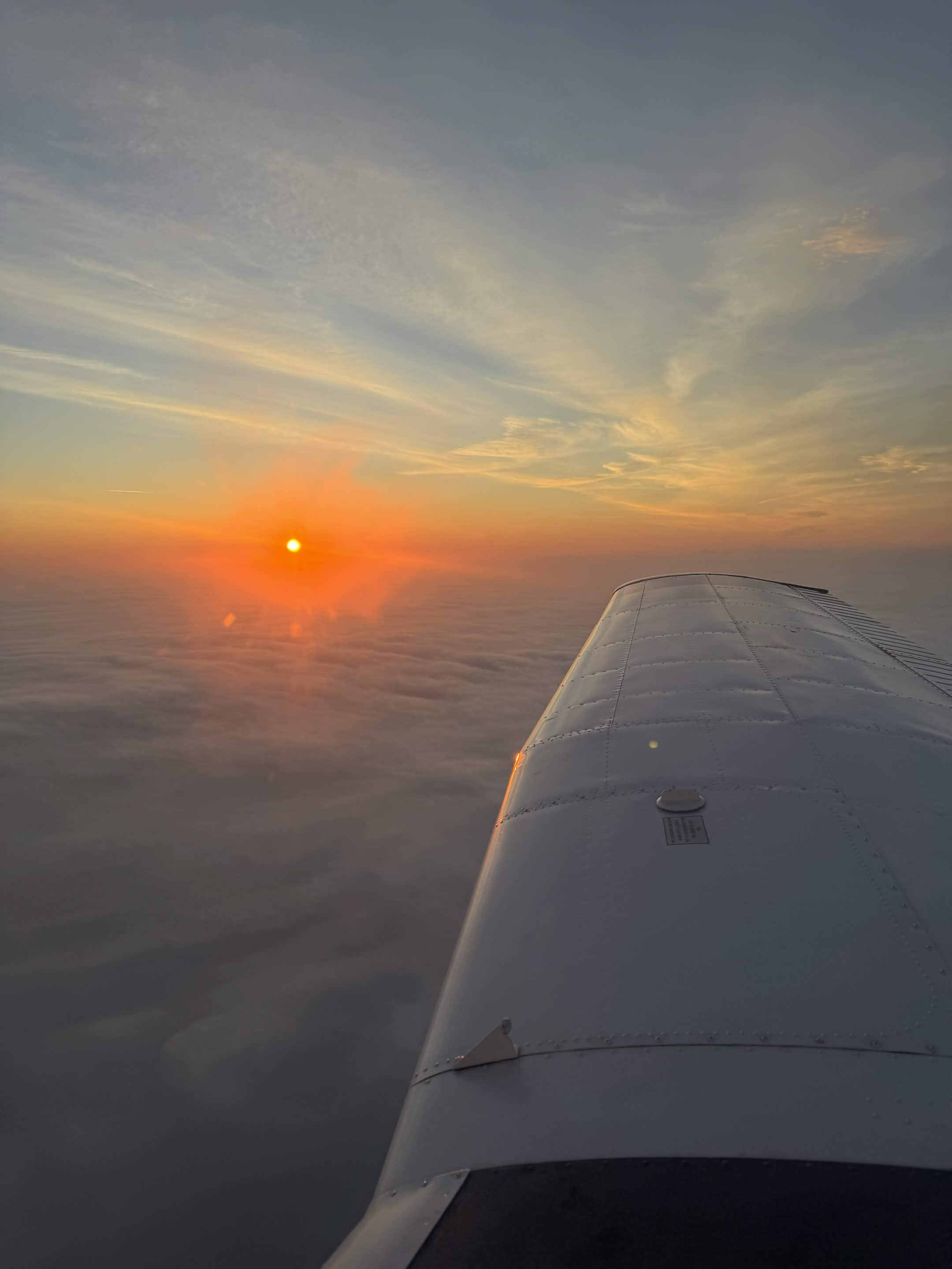 Sunset over clouds